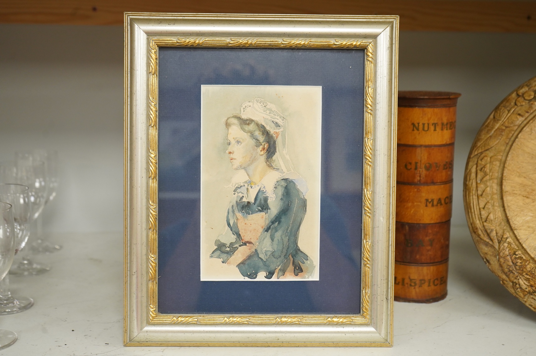 Mid Victorian School, Portrait of a seated lady in an interior, unsigned, watercolour, together with two other watercolours, portraits of women, largest 36 x 29cm